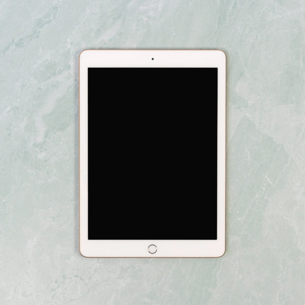 Tablet on marble background 