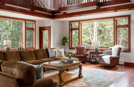 Great Room with coffee table and large sectional in mountain vacation home