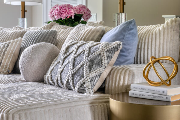 Pillows on cozy sofa with a lot of texture